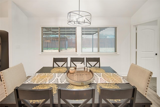 dining space with a chandelier