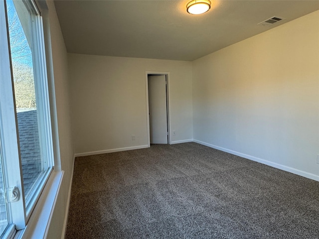 12009 Saddlehorn Ln, Mansfield, TX 76063 - spare room featuring carpet and baseboards
