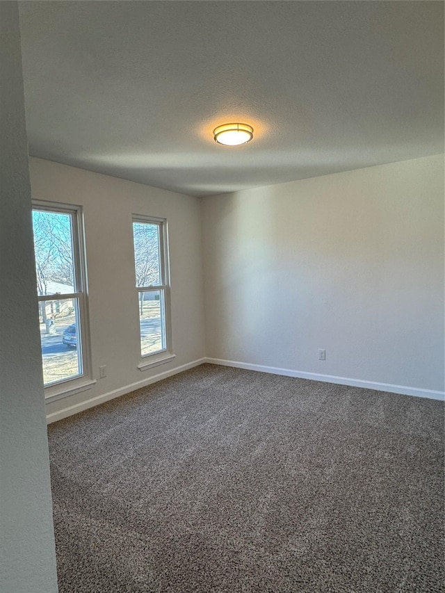12009 Saddlehorn Ln, Mansfield, TX 76063 - carpeted spare room with baseboards