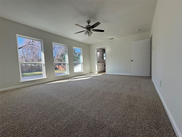 12009 Saddlehorn Ln, Mansfield, TX 76063 - carpeted spare room featuring baseboards and ceiling fan