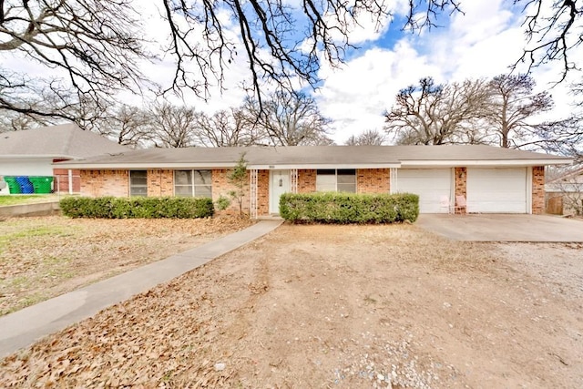 ranch-style home featuring a garage