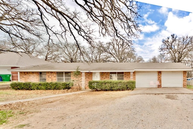 ranch-style home with a garage