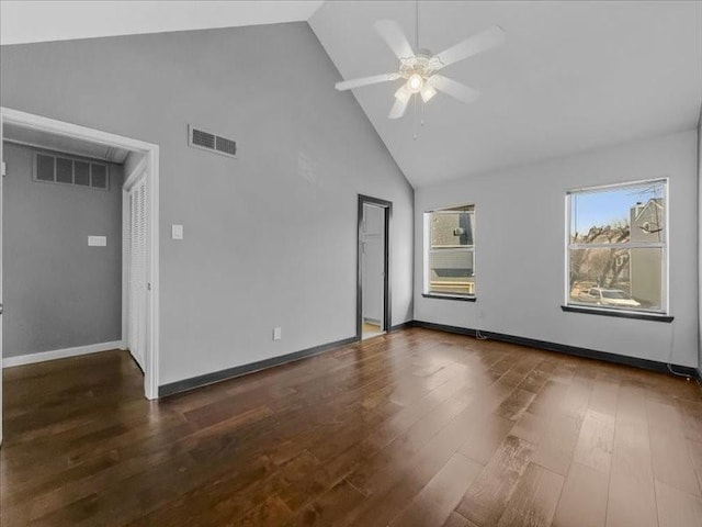 unfurnished room featuring high vaulted ceiling, dark hardwood / wood-style floors, and ceiling fan