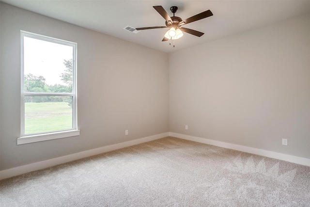 2000 Cumberland Cir, Corsicana, TX 75110 - empty room with baseboards, visible vents, carpet floors, and ceiling fan