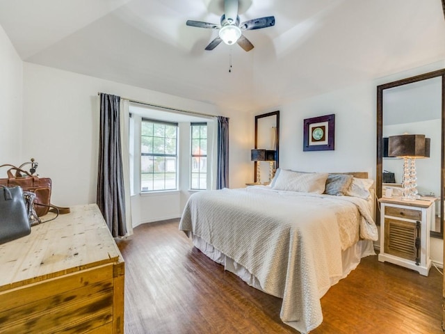 bedroom featuring dark hardwood / wood-style flooring and ceiling fan