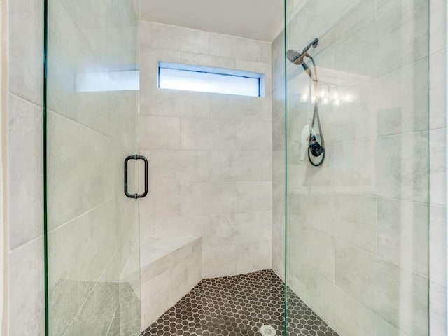 bathroom with an enclosed shower