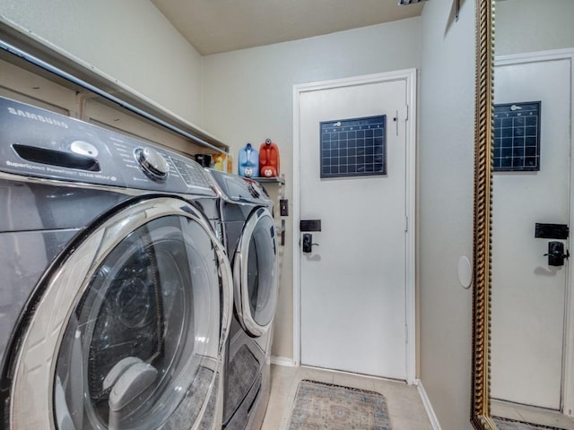 laundry area with washer and dryer