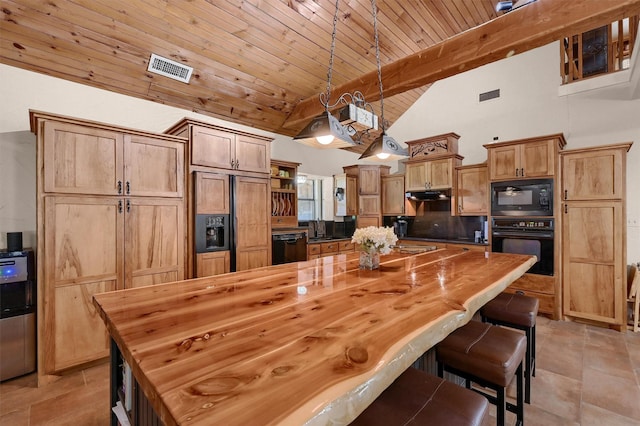 206 Pueblo Dr E, Lake Kiowa, TX 76240 - kitchen with under cabinet range hood, wooden ceiling, wooden counters, and black appliances