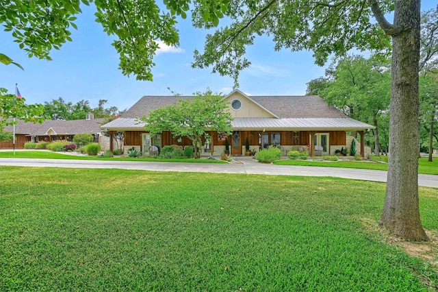 ranch-style home with a front lawn