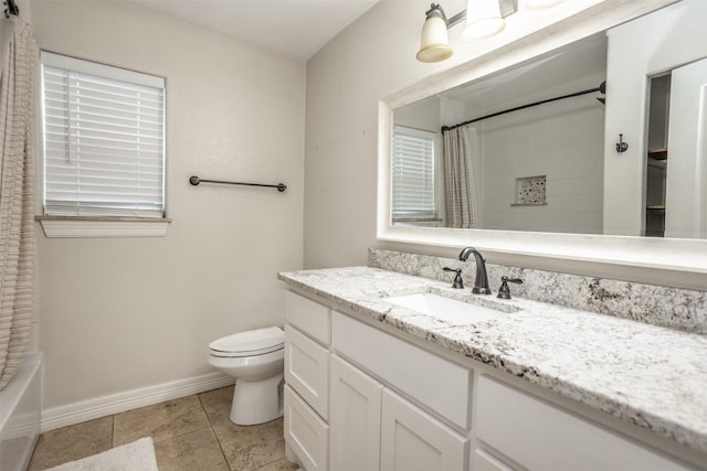 full bathroom with shower / bathtub combination with curtain, vanity, tile patterned floors, and toilet