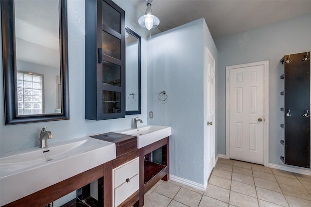 bathroom with vanity and tile patterned flooring