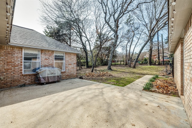 view of patio / terrace featuring a grill