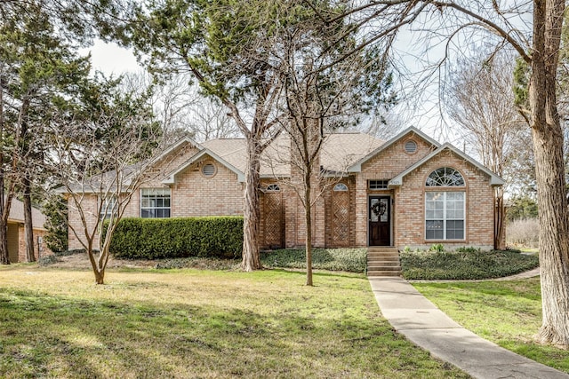 view of front of property with a front lawn