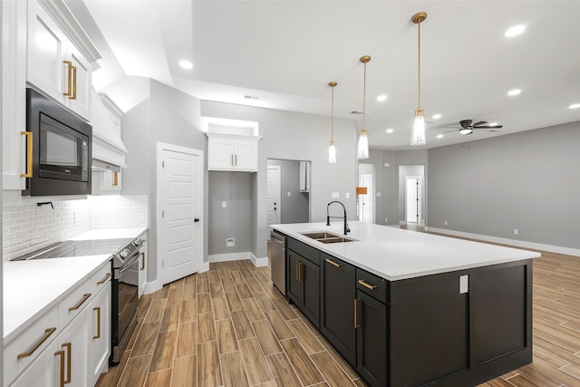 11298 Cedar Dr, Mabank, TX 75156 - kitchen featuring electric stove, a sink, dishwasher, white cabinetry, and ceiling fan