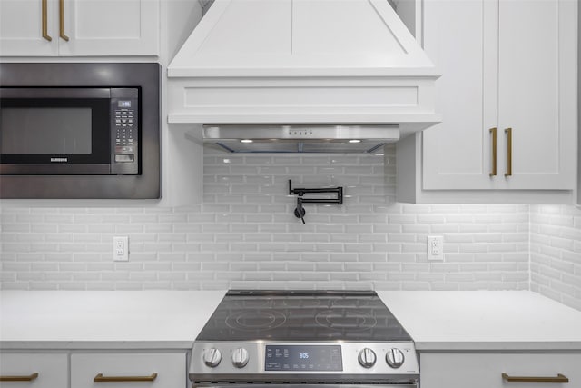 11298 Cedar Dr, Mabank, TX 75156 - kitchen featuring appliances with stainless steel finishes, backsplash, and light countertops