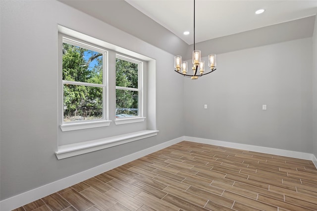 11298 Cedar Dr, Mabank, TX 75156 - unfurnished room with a chandelier, wood finished floors, baseboards, and recessed lighting