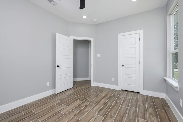 11298 Cedar Dr, Mabank, TX 75156 - unfurnished room with a ceiling fan, wood finished floors, baseboards, and recessed lighting