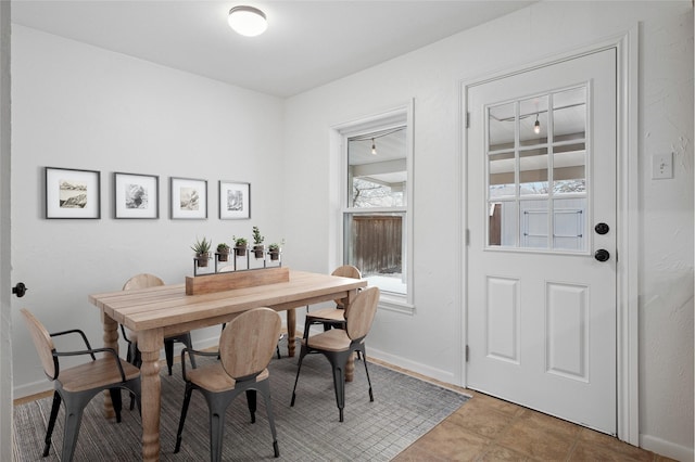 dining space with baseboards