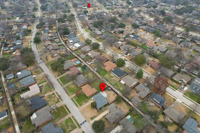 birds eye view of property with a residential view