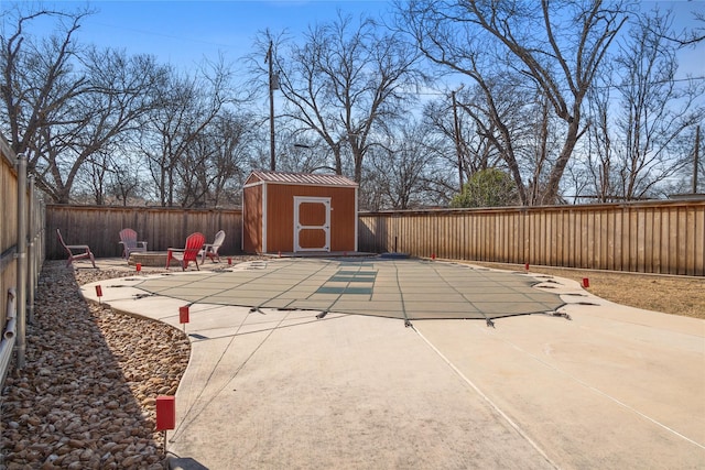 view of patio with an outdoor fire pit and fence