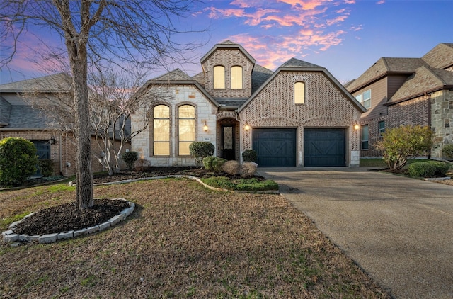 french country inspired facade with a garage