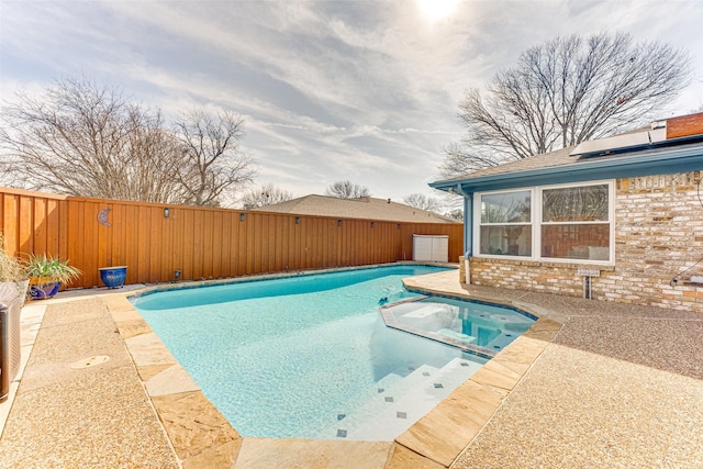 view of pool featuring a patio