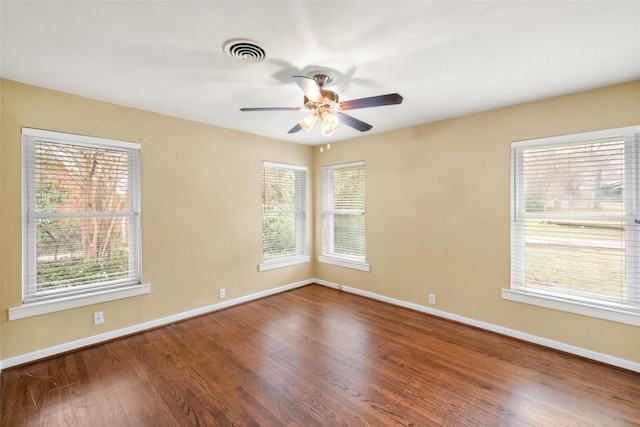 unfurnished room featuring hardwood / wood-style flooring and ceiling fan