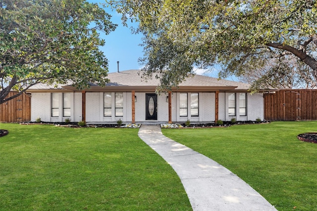 view of front of property with a front lawn