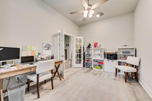 office space featuring ceiling fan, light wood-type flooring, and french doors