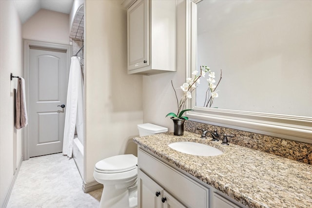 bathroom with vanity, toilet, and shower / bath combo with shower curtain