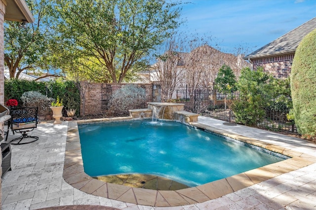 view of swimming pool featuring a patio, a fenced backyard, and a fenced in pool