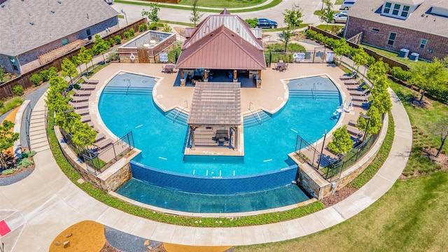 view of swimming pool featuring a patio area