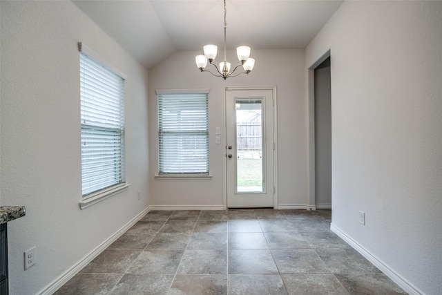 doorway to outside featuring a notable chandelier, baseboards, and vaulted ceiling