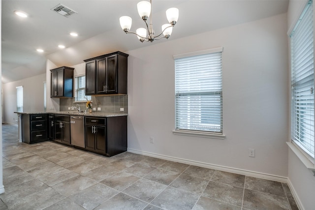 kitchen featuring pendant lighting, dishwasher, decorative backsplash, light stone counters, and dark brown cabinets