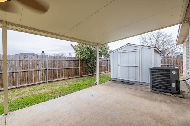 view of patio / terrace featuring a storage shed and central air condition unit