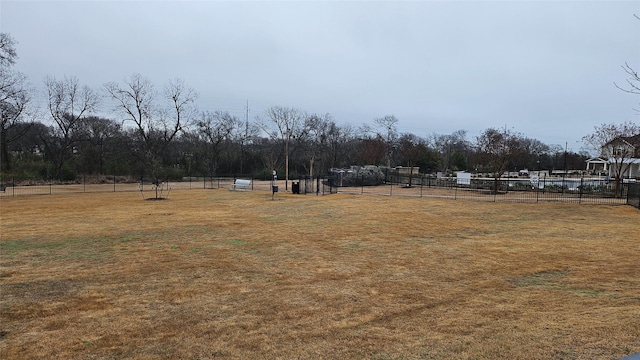 view of yard with a rural view