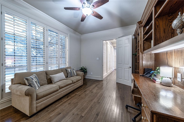 home office with dark wood-type flooring, ceiling fan, and ornamental molding