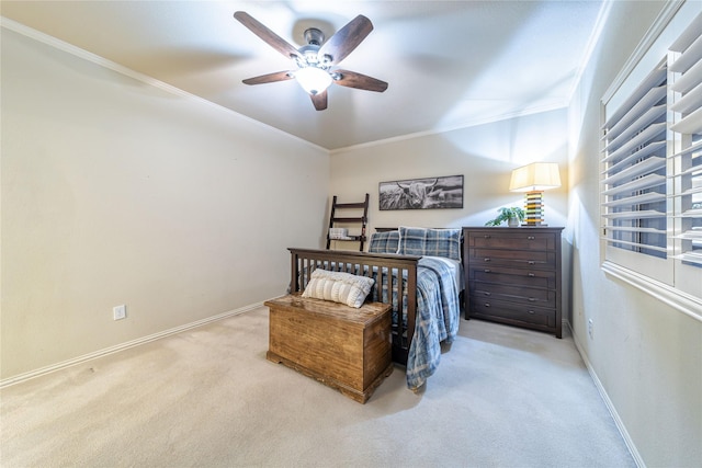 bedroom with crown molding, light colored carpet, and ceiling fan