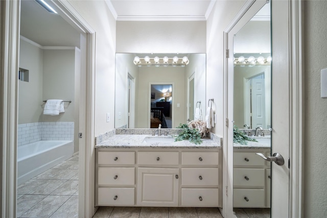 bathroom with vanity, a bath, and crown molding