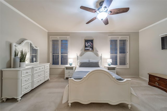 bedroom featuring ornamental molding, light carpet, and ceiling fan