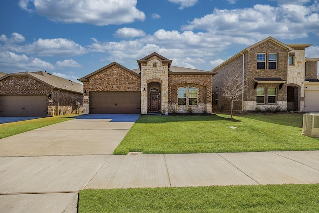 view of front facade with a front lawn and a garage