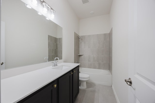 full bathroom featuring toilet, vanity, tile patterned flooring, and tiled shower / bath