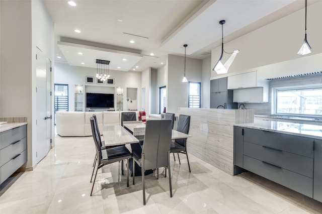 dining area featuring a healthy amount of sunlight