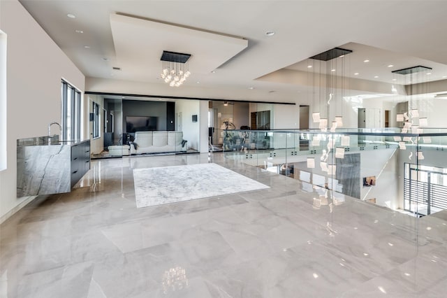 interior space featuring an inviting chandelier and a wealth of natural light