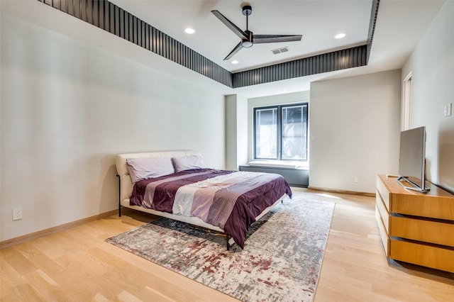 bedroom featuring ceiling fan and light hardwood / wood-style floors