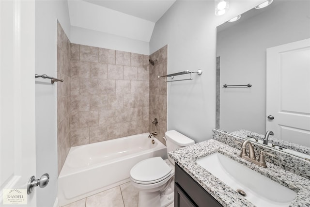 full bathroom with vanity, toilet, tiled shower / bath combo, and tile patterned flooring