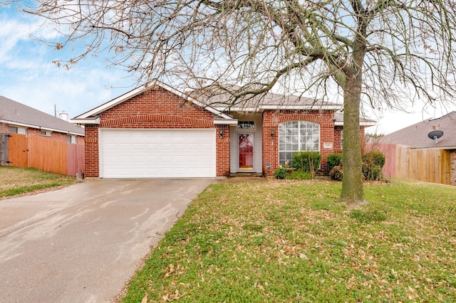 ranch-style home featuring a garage and a front lawn