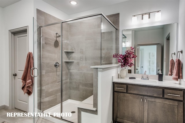 bathroom featuring vanity and walk in shower