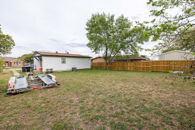 view of yard featuring central AC unit