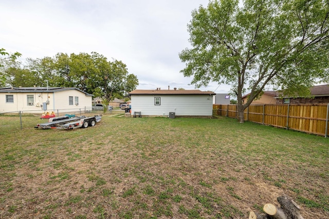 view of yard featuring central AC unit